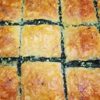 Homemade Spinach Pie · Pie made from spinach, cheese, and and phyllo dough.