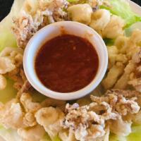 Fried Calamari · Breaded and fried to order. Served with marinara sauce.