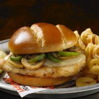 Smothered Chicken Sandwich · Topped with sauteed onions, green peppers and mushrooms. This plump, juicy, grilled chicken ...