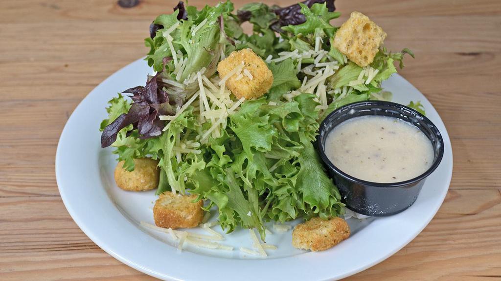 House Salad · Organic spring and romaine mix with grape tomatoes, red onions, mozzarella, and croutons.