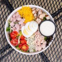 Turkey Cobb Salad · Organic spring and romaine mix with turkey, tomatoes, hard-boiled egg, rasher bacon, mushroo...