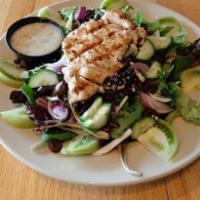 Mediterranean Salad · A bed of spring mix topped with fresh cucumber, green tomato, black olives, red onions, feta...