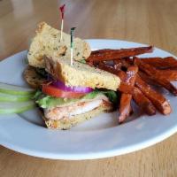 Chicken Club · Grilled chicken breast topped with lettuce, tomato, rasher bacon, red onion, and Swiss chees...