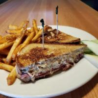 Reuben · Corned beef, sauerkraut, Swiss, and Thousand Island dressing on grilled rye bread. Recommend...