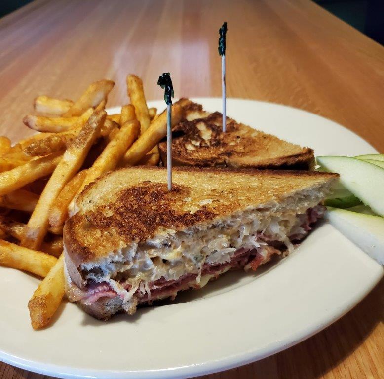 Reuben · Corned beef, sauerkraut, Swiss, and Thousand Island dressing on grilled rye bread. Recommended by Eileen.