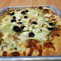 The Greek Pizza · A pesto base with black olives, green tomato, chicken, mozzarella and feta.