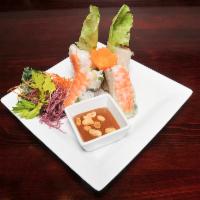 Fresh Summer Rolls · Filled with pouched shrimp, sliced pork, rice noodle, mint served with peanut sauce.