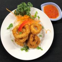 Calamari · Panko-crushed jumbo calamari rings served with sweet chili sauce.