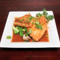 IPHO Fish · Pan-fried fish fillet with steamed vegetables in our special lemongrass sauce.