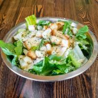 Lil Caesar Salad  · Romaine, house made croutons, shaved parmesan blend and grated parmesan. With Caesar dressing.
