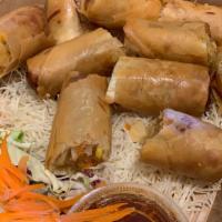 Crispy Rolls · Fried vegetarian egg roll. Served with sweet and sour sauce. Vegetarian.