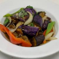 Eggplant · Pork sautéed with eggplant, bell pepper, sweet basil in oyster sauce.