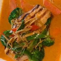 Choo-Chee Salmon · Grilled salmon, bell pepper, sweet basil, vegetables topped with red coconut milk curry sauce.