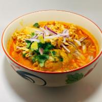 Kao soi · Northern Thai style egg-noodles soup curry with braised chicken red onion cilantro mustard c...