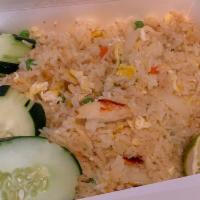 Fried Rice Crab · Fried rice sautéed with crab meat, egg, onion, tomato, pea-carrot.