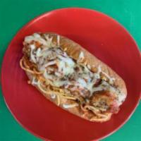Dirty Meatball Sub · Spaghetti and sauce under the meat.