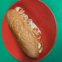 Chicken Parmesan Hero · A long sandwich on a roll with breaded chicken, tomato sauce and cheese.