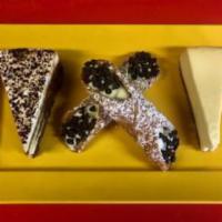 Dessert Tray · Cheesecake, tiramisu and cannoli.