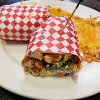 Santa Fe Wrap · Chipotle marinated crispy or grilled chicken wrapped in a large flour tortilla with black be...