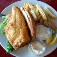 Cod Fish Sandwich · Fried golden brown, served on a grilled hoagie bun with lettuce, tomato, lemon, tartar sauce...