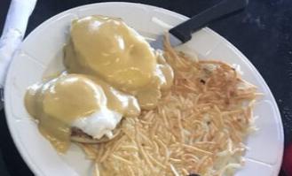 Eggs Benedict and Hash Browns · 2 basted eggs, one English muffin with Canadian bacon and smothered with hollandaise sauce