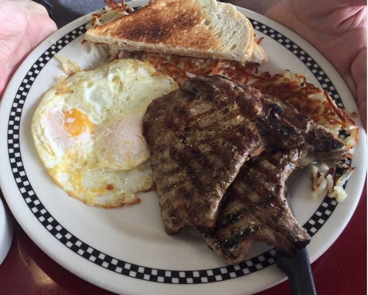 Pork Chops and Eggs · Enjoy 2 grilled pork chops, served with 2 eggs, hash browns, and toast.