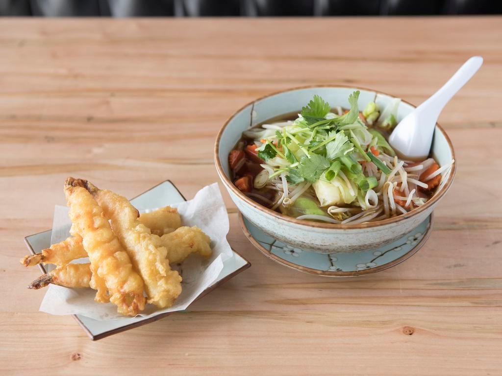S5. Shrimp Tempura Soup · Made with vegetables in a clear broth shrimp is served on the side. Served with choice of noodles.