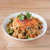N6. Spicy Jungle Noodles · Stir fried flat noodles, eggs, broccoli, carrots, cabbage and celery with garlic sauce. Spicy.