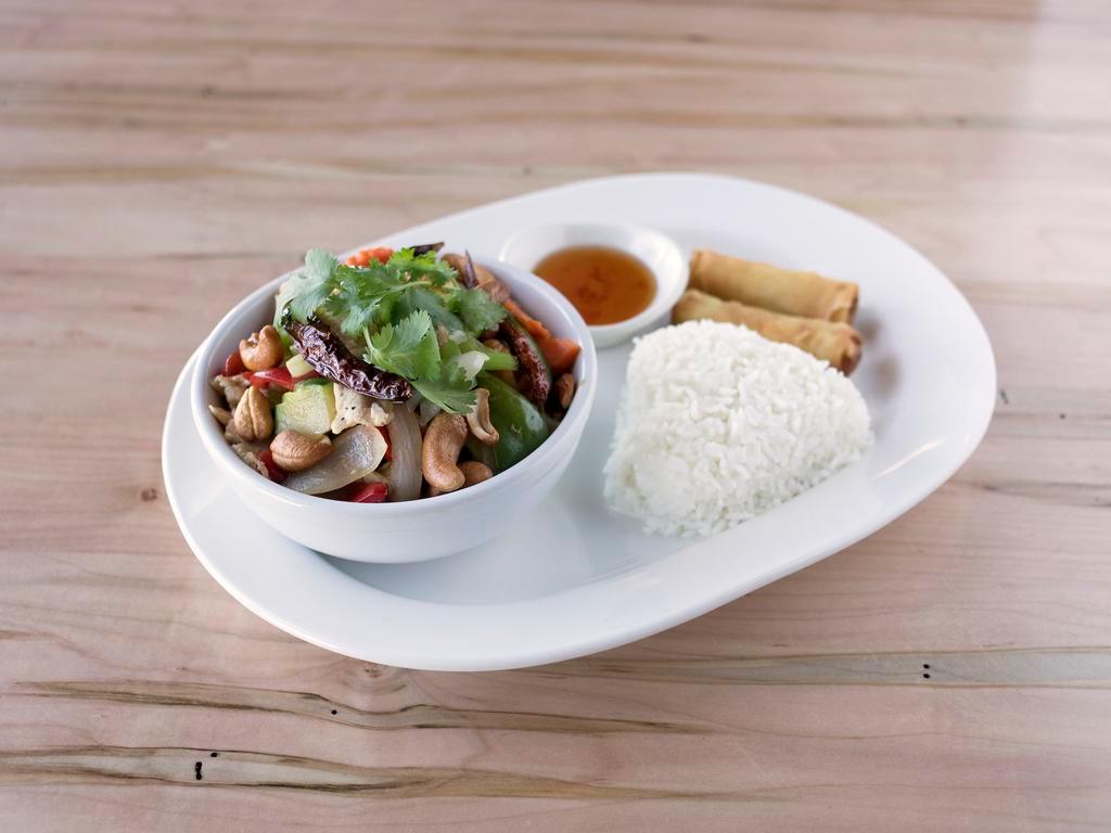 D7. Pad Cashew Nuts Dinner Combo Plate · Roasted cashew nuts cooked with Thai sauce, bell peppers, celery, carrots, onions and mushrooms. Served with steamed rice, 2 egg roll and choice of soup. Substitute for fried rice for an additional charge.