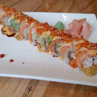 Summer Sun Roll · Shrimp tempura, spicy salmon and cucumber inside. Fresh salmon, avocado, special sauce and s...