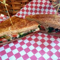 Viva Las Veggie Sandwich · A grilled vegetarian sandwich made with portobello mushroom, spinach, smoked swiss, roasted ...