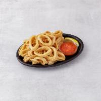 Calamari Fritti · Served with spicy or mild sauce.