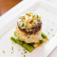 Signature Jumbo Lump Crab Cake  · Served with beurre blanc and sliced asparagus.