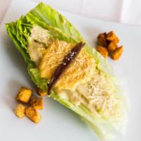 Caesar Salad · Romaine hearts, crispy Parmesan and anchovy.