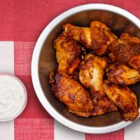 Buffalo Wings · Our oven-roasted Buffalo wings have just the right blend of spices to give them the true 
