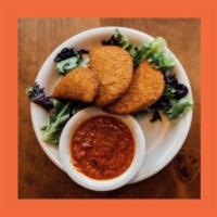 Fried Mozzarella · Breaded and deep-fried. Served with a side of marinara sauce.