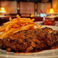 12oz Skirt Steak Frites · choice of side and sauce (pictured with au poivre)