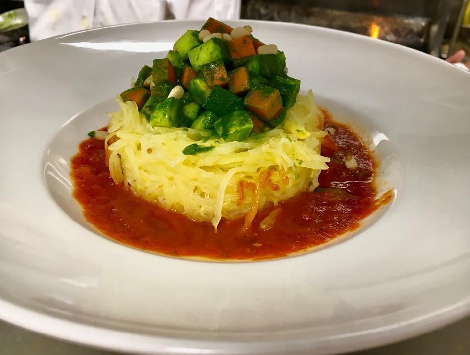 Spaghetti Squash · oven roasted spaghetti squash, san marzano tomato sauce, vegetable ragout, pine nuts, basil pesto