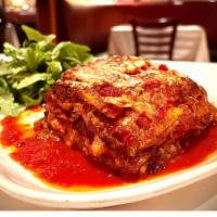 Eggplant Parmesan  · Arugula salad