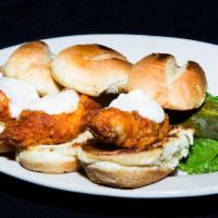 Buffalo Bleu Sliders · 3 of our hand breaded chicken fingers tossed in our TDC sauce, topped with bleu cheese on po...