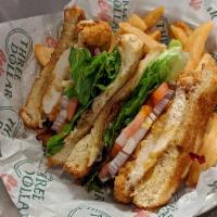 Crispy Chicken Club · Hand battered fried chicken breast topped with American cheese, bacon, lettuce, tomato and r...