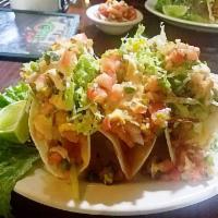 Fish Tacos · 3 crispy fish tacos topped with chipotle sauce and pico de gallo. Also available in chicken....