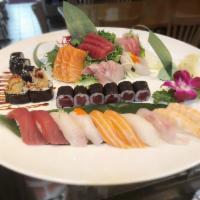 Sushi and Sashimi for 2 · 10 pieces sushi, 15 pieces sashimi, tuna roll and shrimp tempura roll.