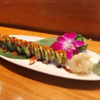 Dragon Roll · Eel roll with avocado and tobiko on top.
