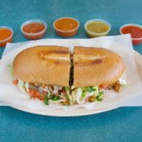 Torta de Carne Asada · Steak sandwich. Served on a toasted Mexican bread roll with beans, cheese, onions, tomatoes,...