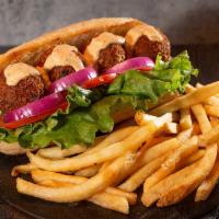 Cajun Boudin Po Boy · 4 large boudin balls perfectly fried with 242 zesty sauce served on a toasted buttered hoagi...