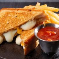 Almost Famous Mozzarella Melt Sandwich · Breaded mozzarella sticks fried golden brown smothered with American cheese melted between T...