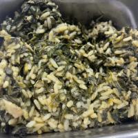Spanakorizo · Baked fresh spinach, dill, scallions mixed with rice.