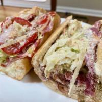 1/2 Bub's Italian Hoagie Sandwich · Genoa salami, sweet and hot capicola, pepperoni, mild provolone, lettuce, Roma Tomato, raw o...