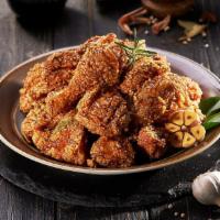 2. Garlic Soy Chicken · Our signature crispy chicken tossed in a soy-garlic glaze.